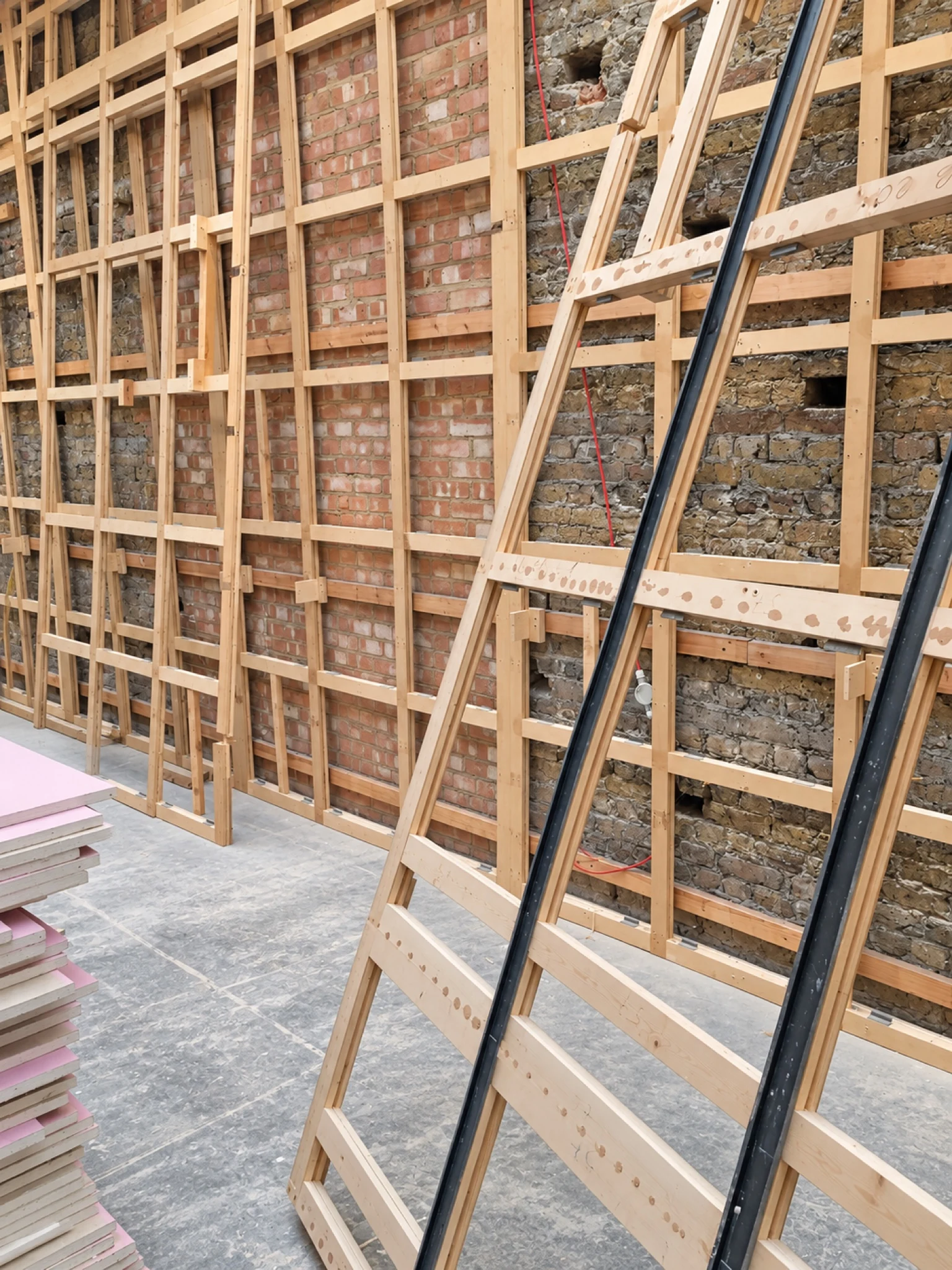 Work in progress: timber framing before the wall finishes.