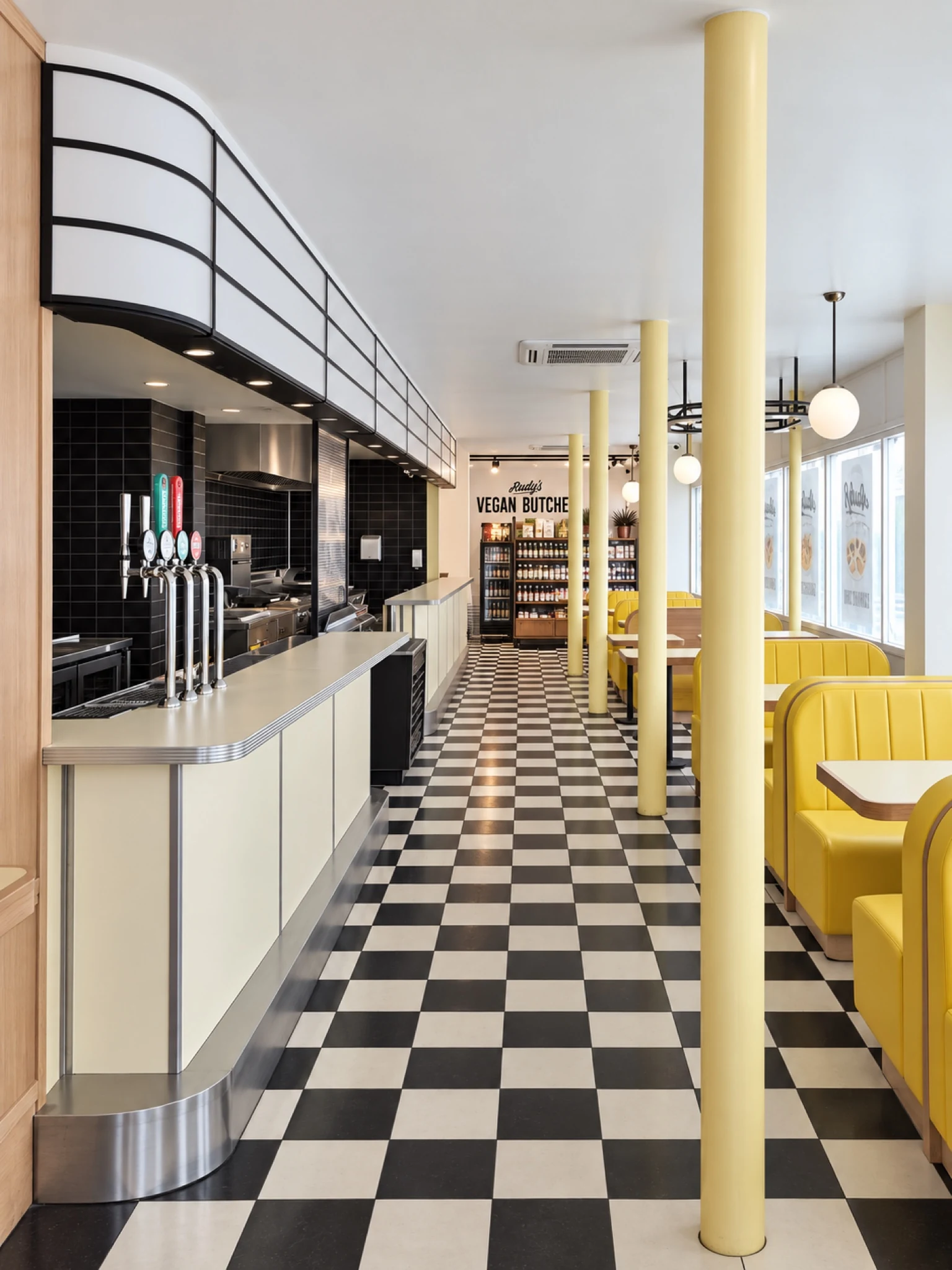 A view along the counter and the restaurant’s central aisle.